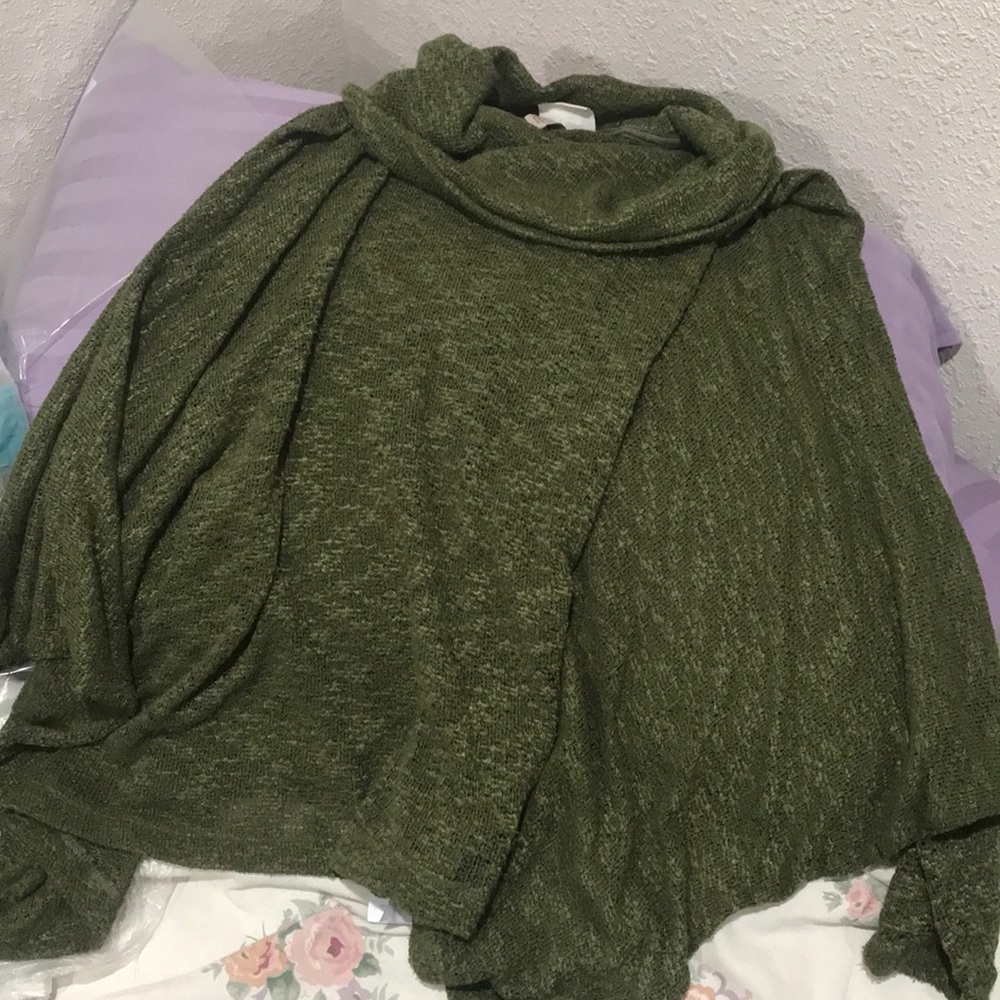 Green pancho with laces back